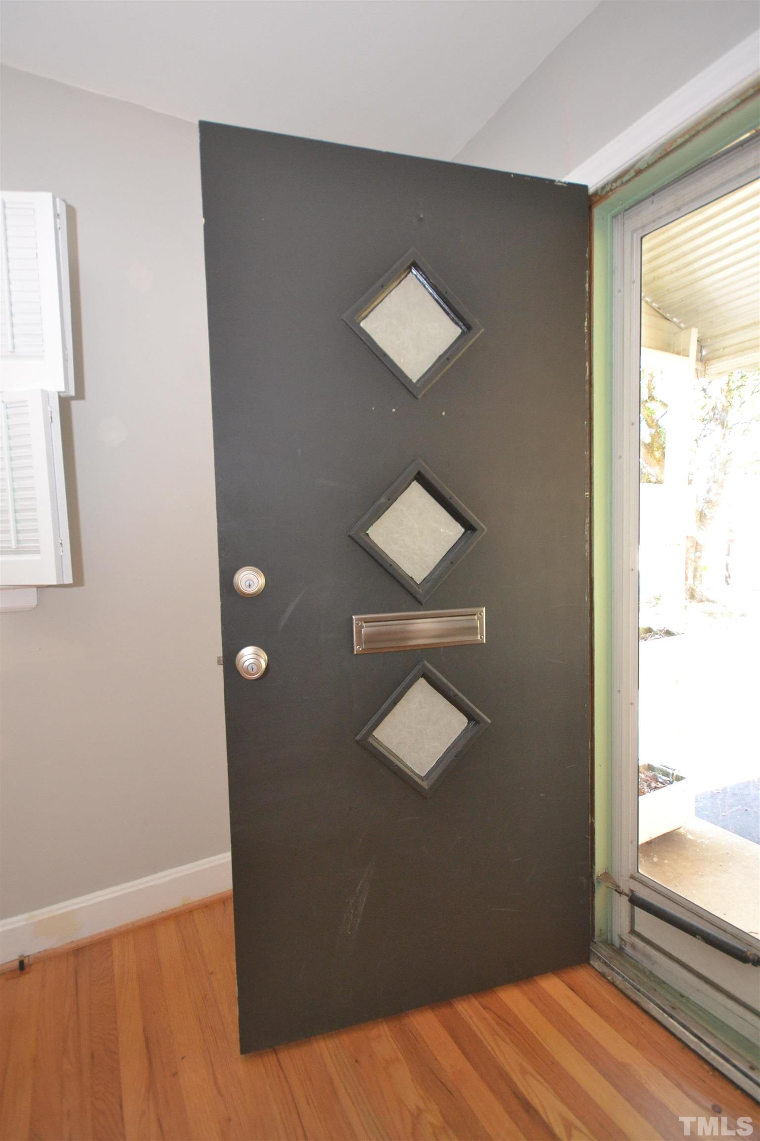1713 Forest Road Durham, NC 27705 - Photo 21 of 35 a view of a livingroom with a window