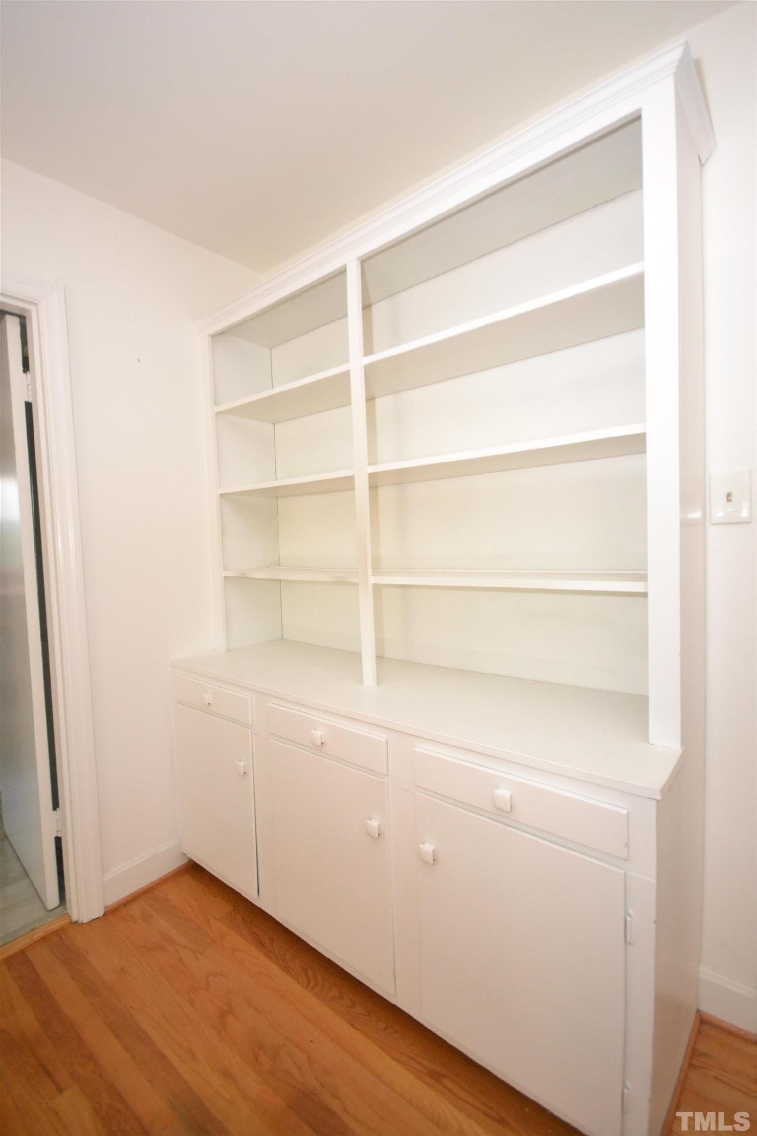 1713 Forest Road Durham, NC 27705 - Photo 24 of 35 a view of an empty room with empty racks