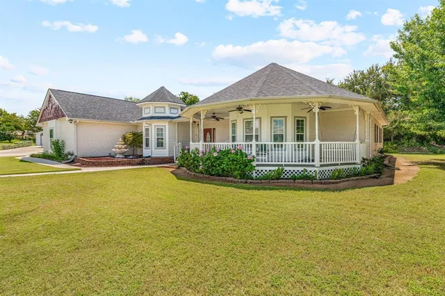 a front view of a house with swimming pool
