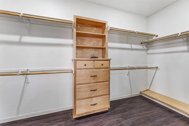 a view of an empty walk in closet