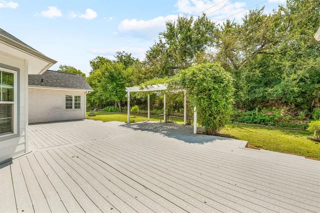 a view of backyard with green space