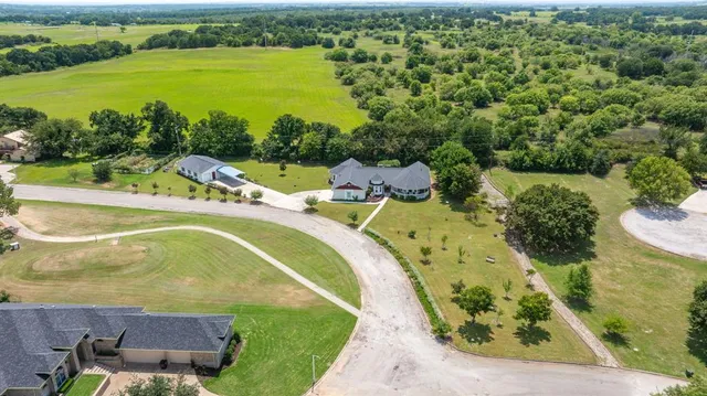 a view of a swimming pool with a garden