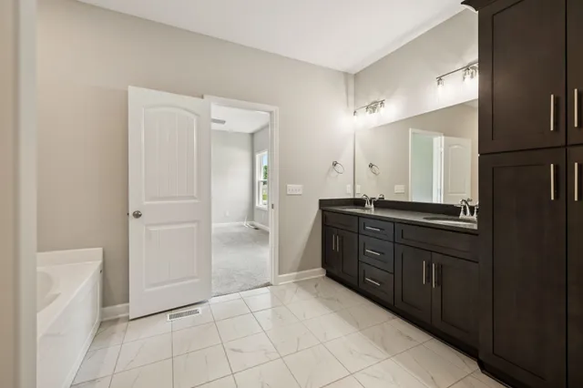 an empty room with closet area