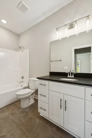 a bathroom with a sink and a toilet