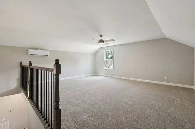 a view of backyard with deck and wooden floor