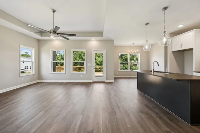 a view of kitchen with wooden floor