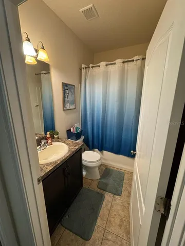 a view of a livingroom with a window