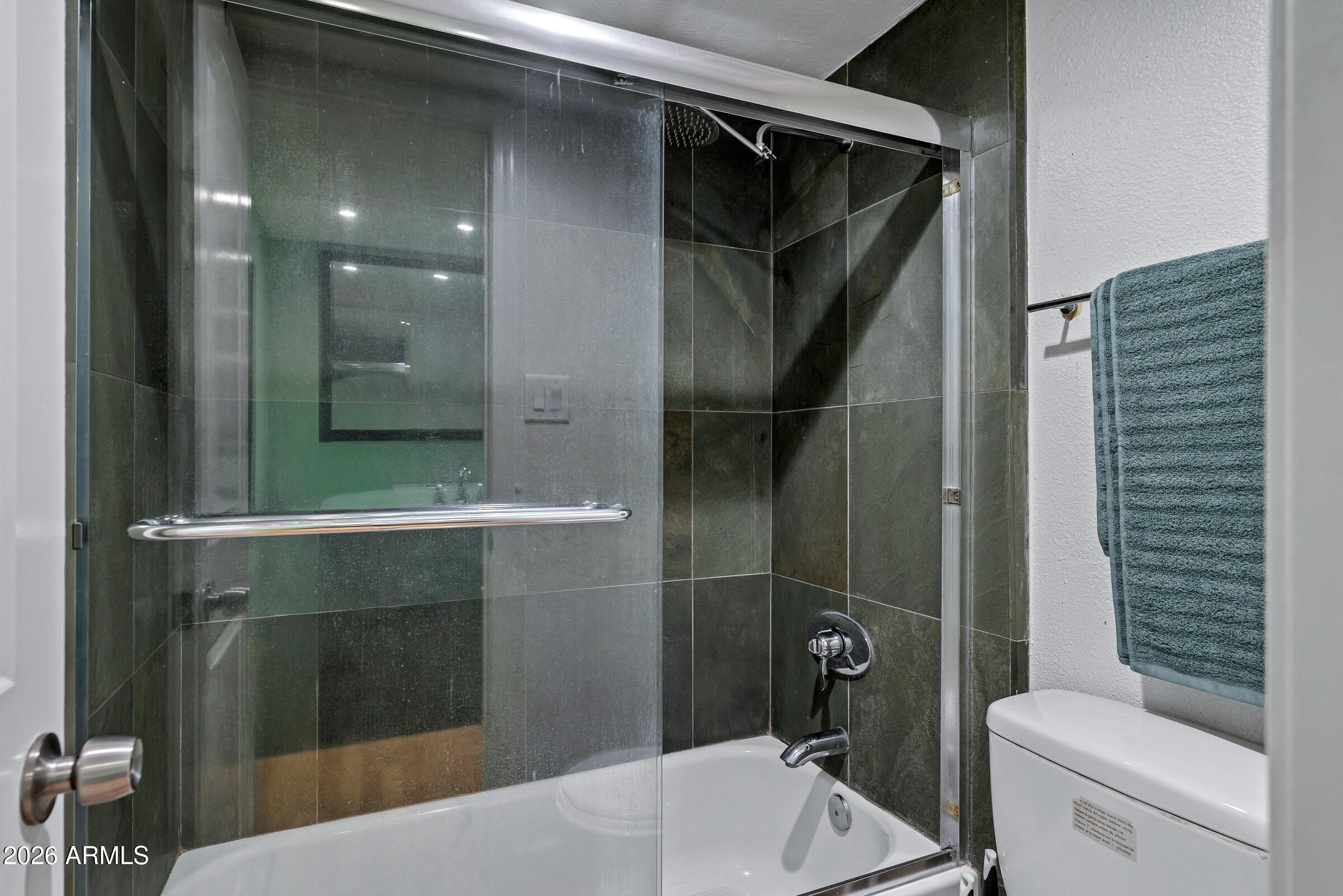 4410 North Longview Avenue, Unit 119 Phoenix, AZ 85014 - Photo 16 of 22 a bathroom with a sink a toilet and shower
