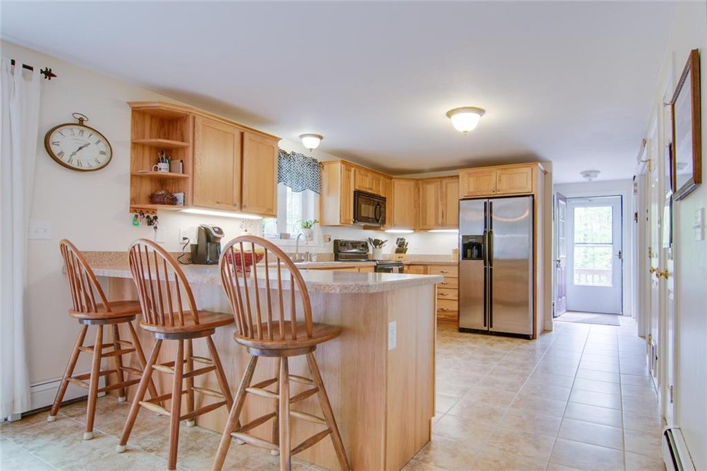 11 Molly Lane Sebago, ME 04029 - Photo 8 of 22 Kitchen/dining area.