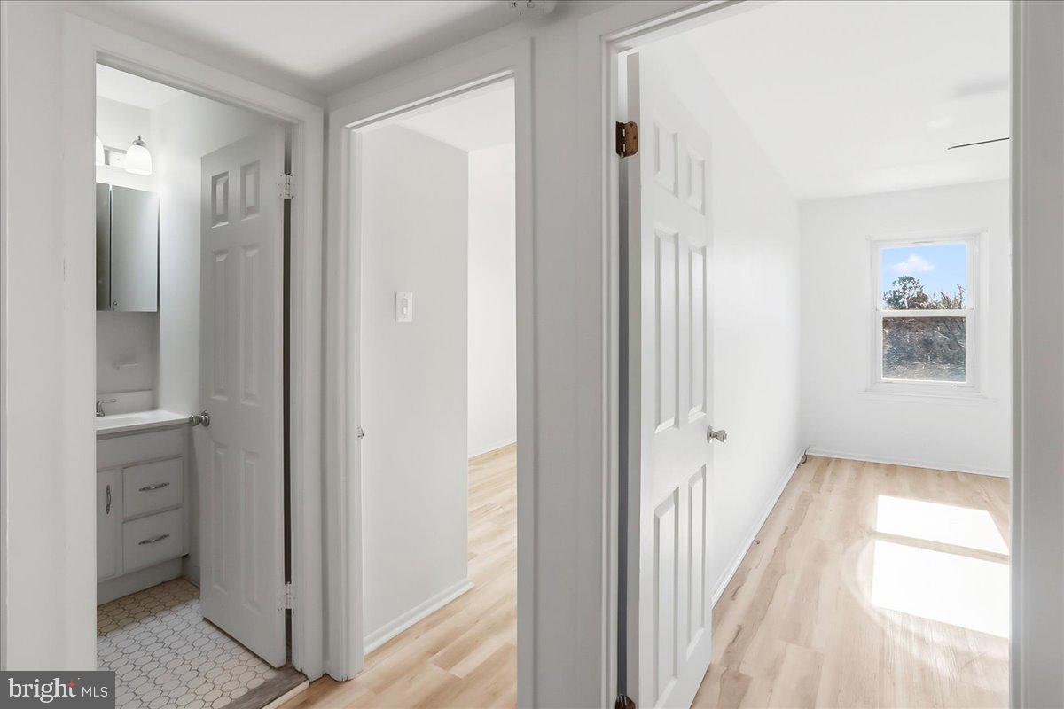 12062 Abby Road Philadelphia, PA 19154 - Photo 20 of 28 a view of a hallway with wooden floor and closet area