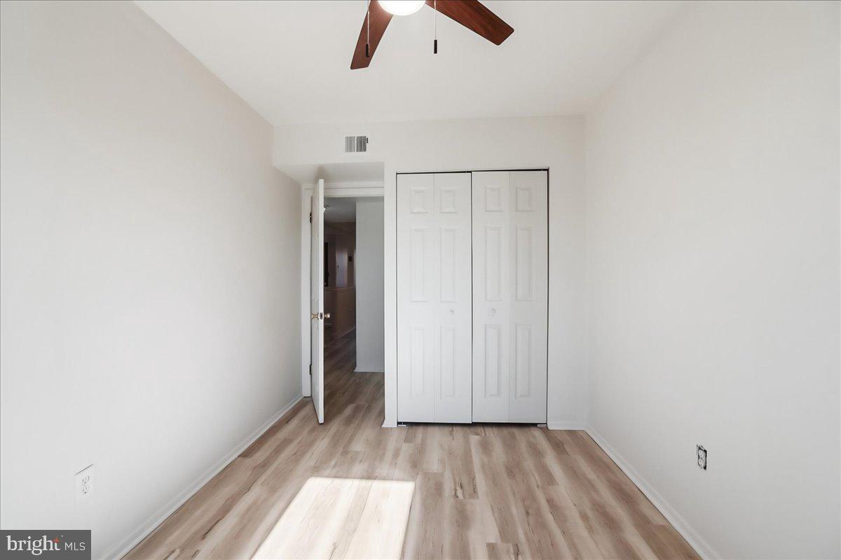 12062 Abby Road Philadelphia, PA 19154 - Photo 23 of 28 an empty room with ceiling fan and window
