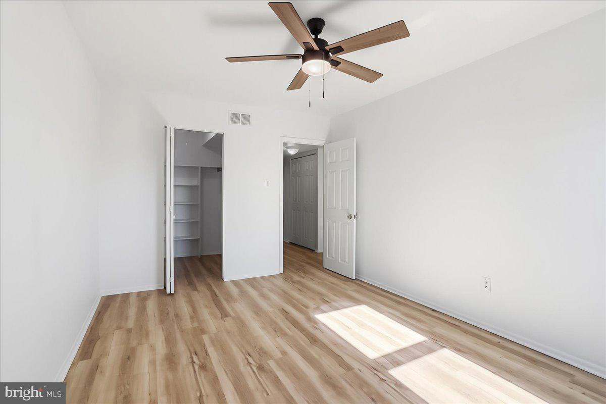 12062 Abby Road Philadelphia, PA 19154 - Photo 26 of 28 an empty room with a window and a fan