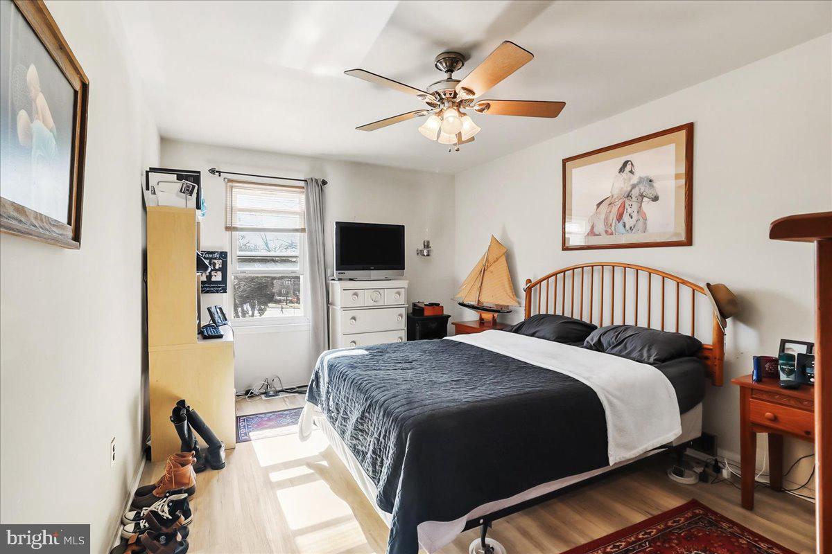 12062 Abby Road Philadelphia, PA 19154 - Photo 7 of 28 a spacious bedroom with a bed and a flat screen tv
