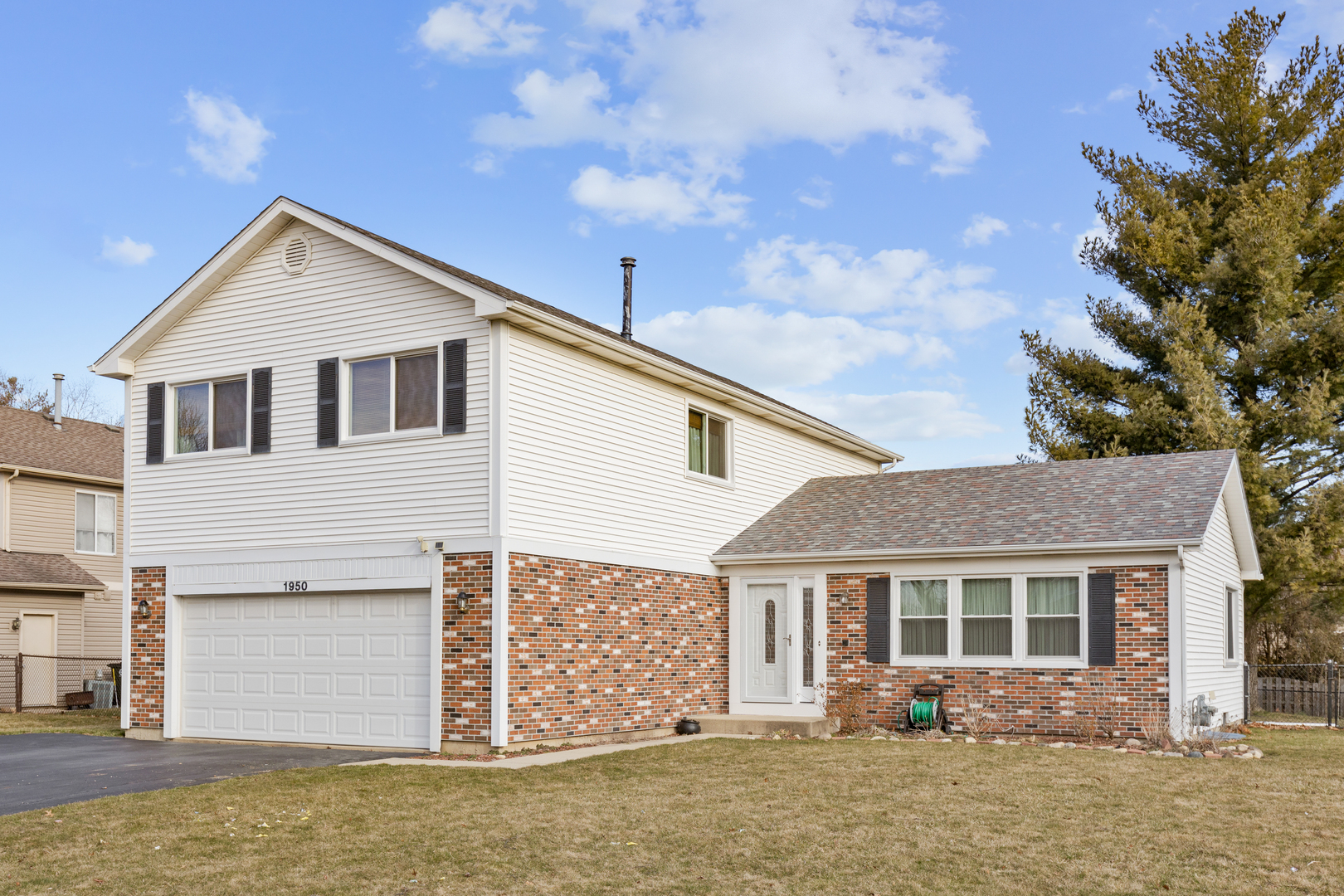 front view of house with a yard