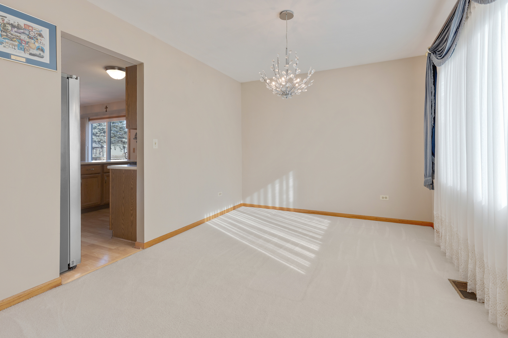 1950 Tanglewood Drive Algonquin, IL 60102 - Photo 11 of 34 en empty room with windows and entrance