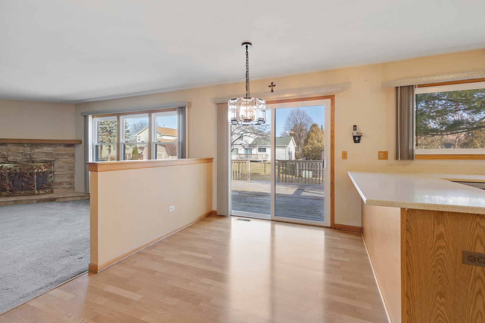 1950 Tanglewood Drive Algonquin, IL 60102 - Photo 9 of 34 wooden floor in an empty room with a window