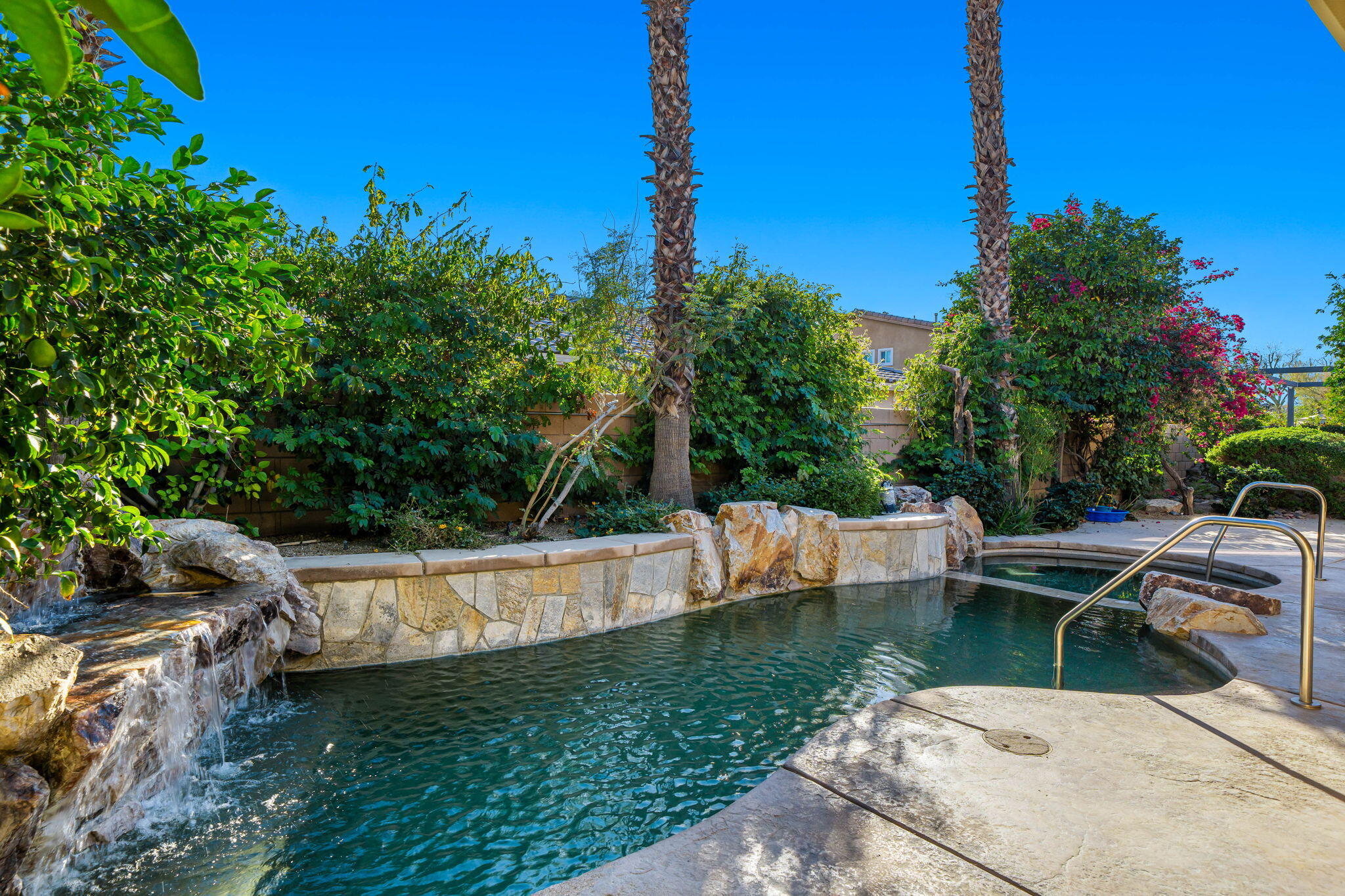 83399 Wagon Road Indio, CA 92203 - Photo 14 of 48 a view of a swimming pool with a patio