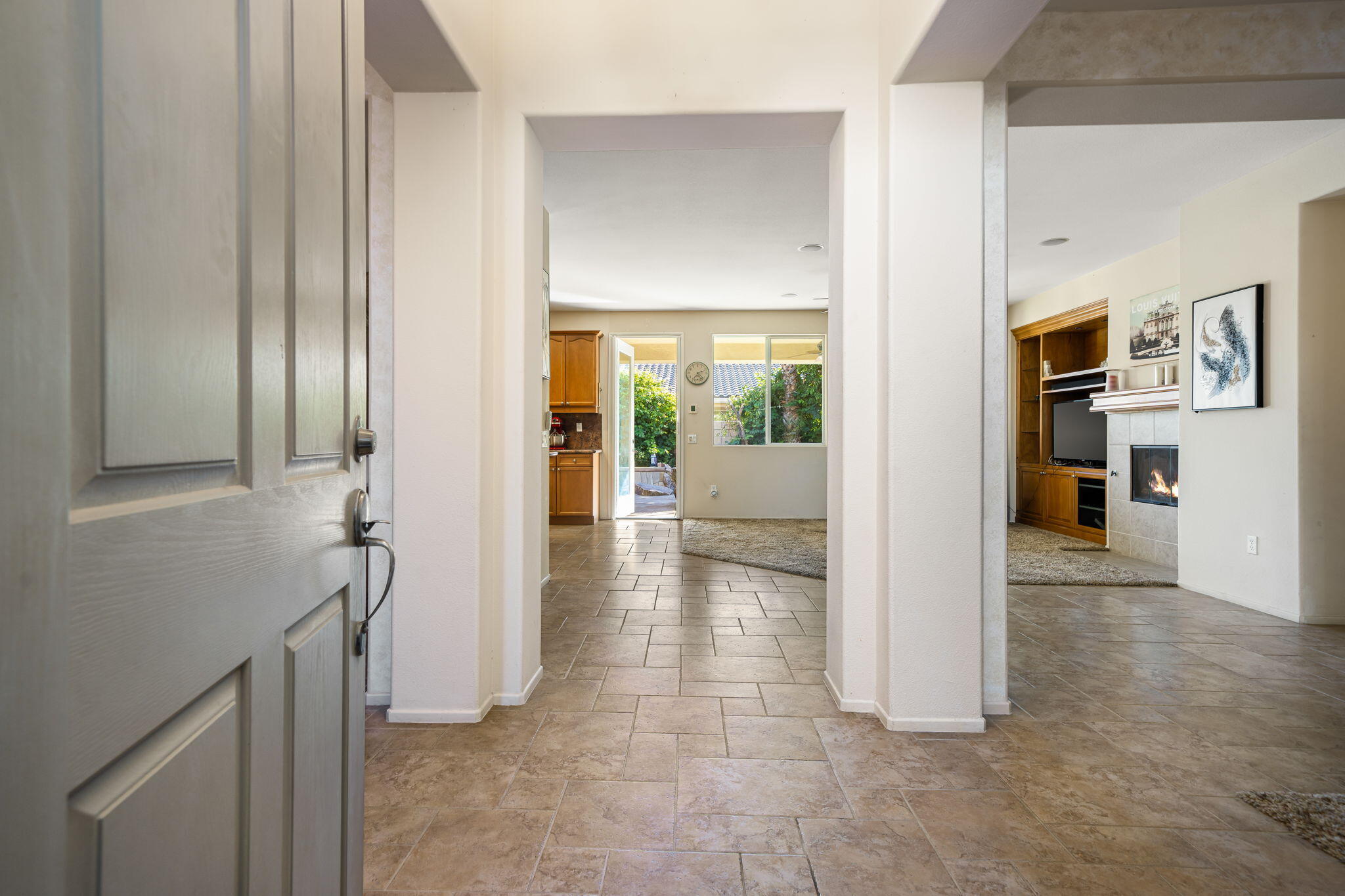 83399 Wagon Road Indio, CA 92203 - Photo 24 of 48 a view of livingroom with furniture and floor to ceiling window