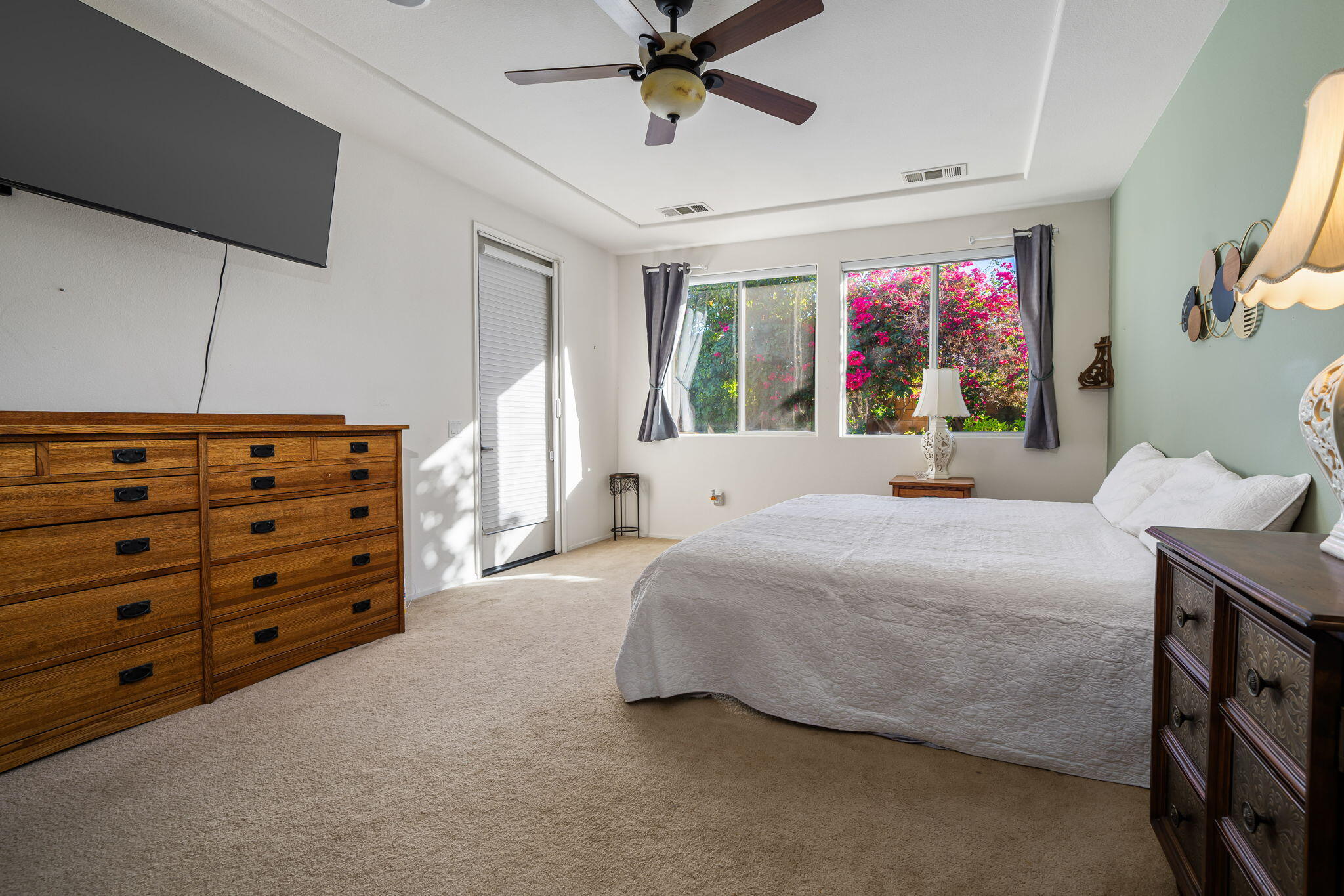 83399 Wagon Road Indio, CA 92203 - Photo 32 of 48 a bedroom with a bed dresser and a window