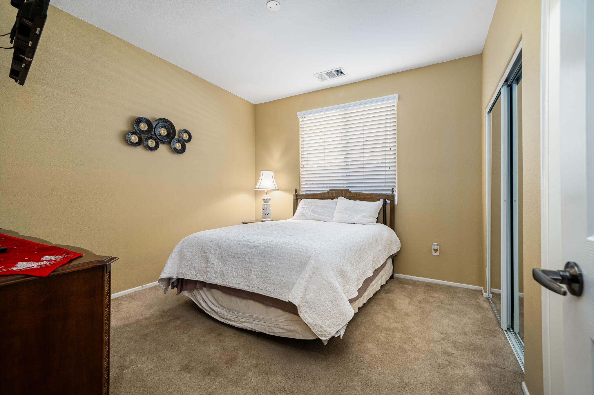 83399 Wagon Road Indio, CA 92203 - Photo 36 of 48 a bedroom with a bed and a window