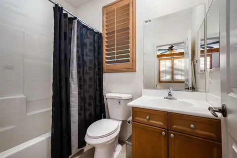 a bathroom with a bath tub and a shower