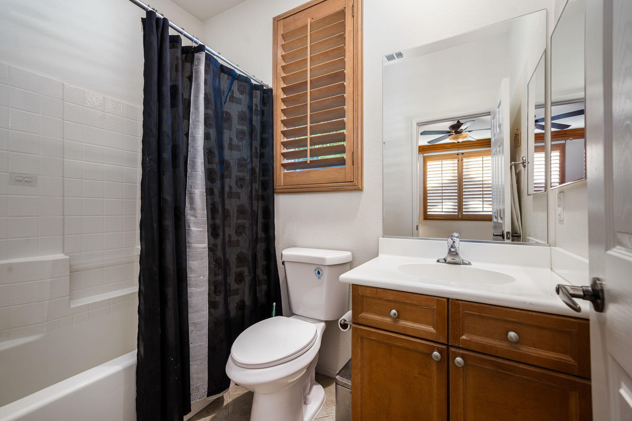 83399 Wagon Road Indio, CA 92203 - Photo 38 of 48 a bathroom with a sink a toilet and shower