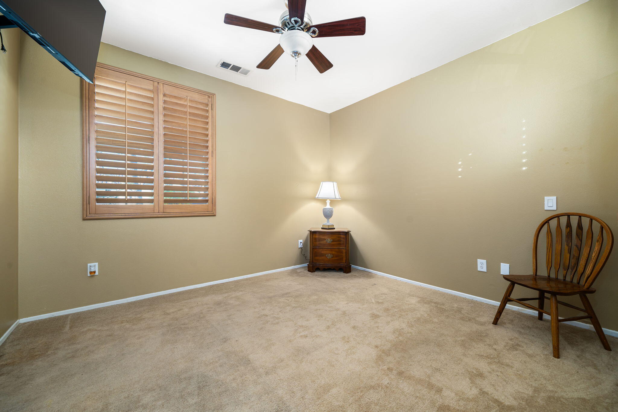 83399 Wagon Road Indio, CA 92203 - Photo 40 of 48 a view of a room with a window and ceiling fan