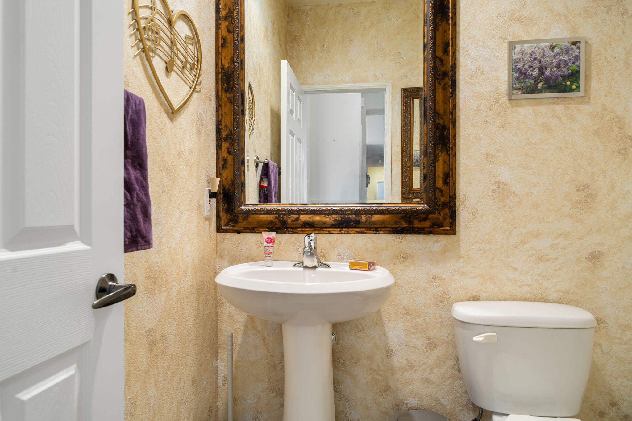 83399 Wagon Road Indio, CA 92203 - Photo 43 of 48 a bathroom with a toilet sink and mirror