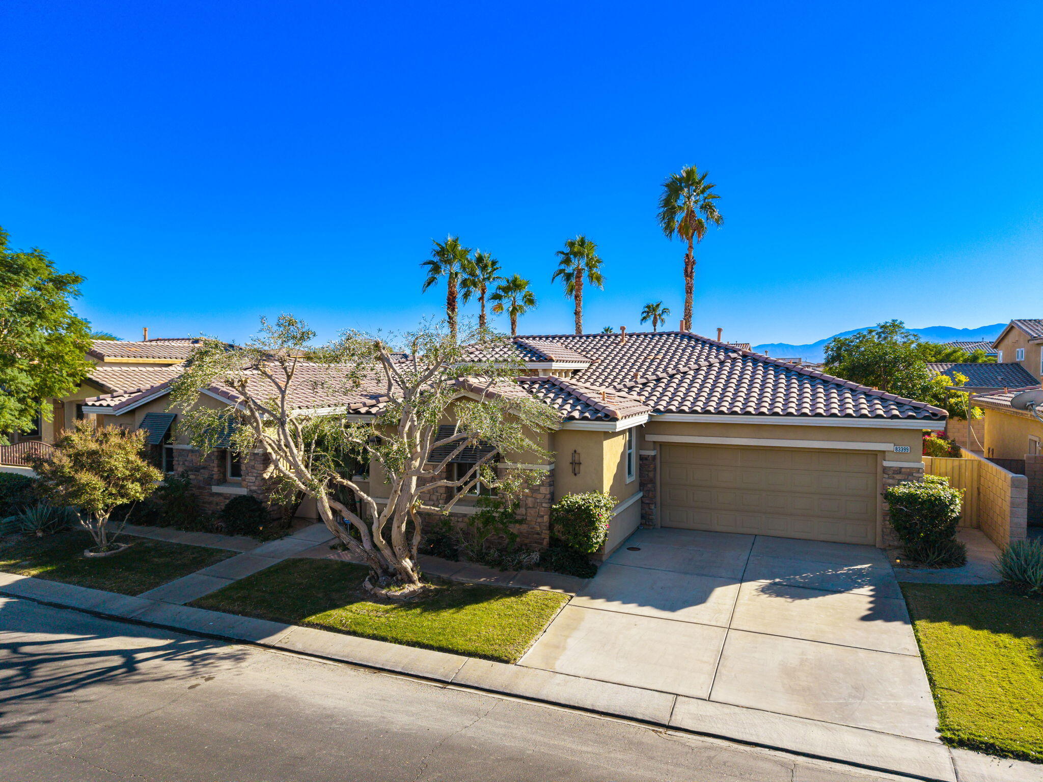 83399 Wagon Road Indio, CA 92203 - Photo 7 of 48 a view of a house with a street