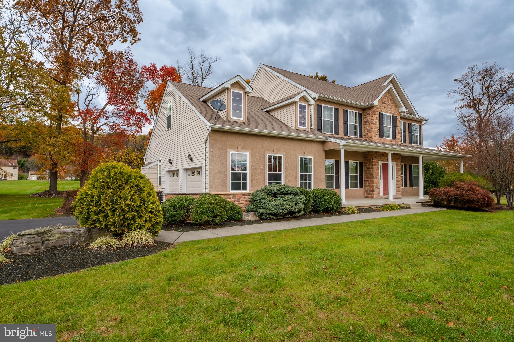 3505 Woodbyne Road Hellertown, PA 18055 - Photo 2 of 78 a front view of a house with garden