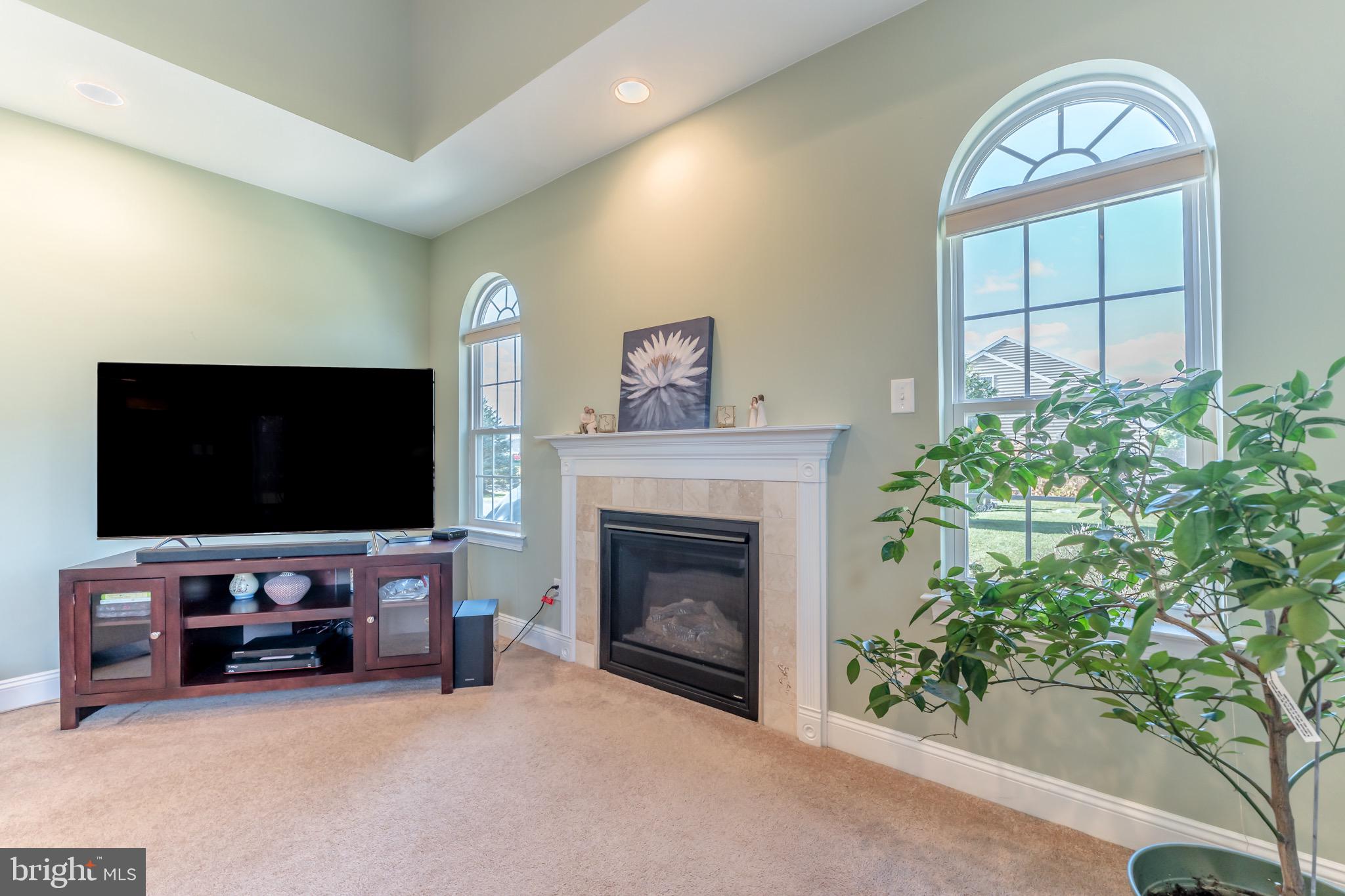 3505 Woodbyne Road Hellertown, PA 18055 - Photo 23 of 78 a living room with furniture and a flat screen tv