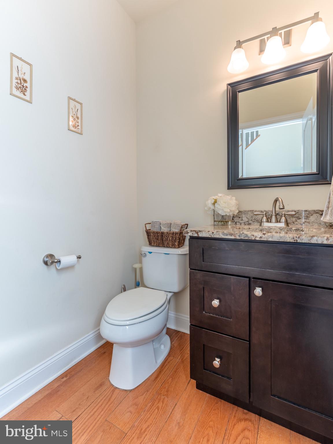 3505 Woodbyne Road Hellertown, PA 18055 - Photo 30 of 78 a bathroom with a toilet sink and mirror
