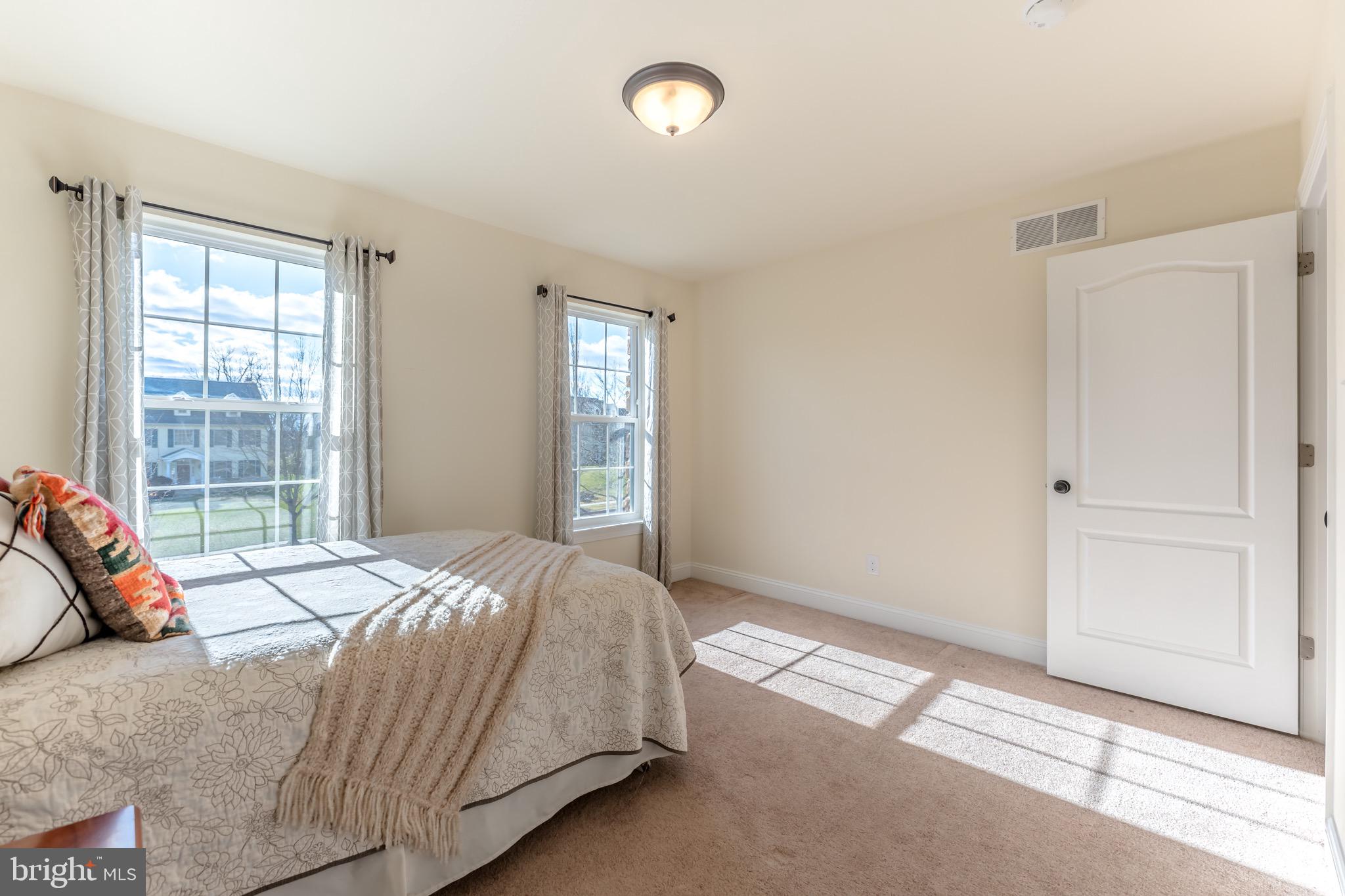 3505 Woodbyne Road Hellertown, PA 18055 - Photo 48 of 78 a bedroom with a bed and a window