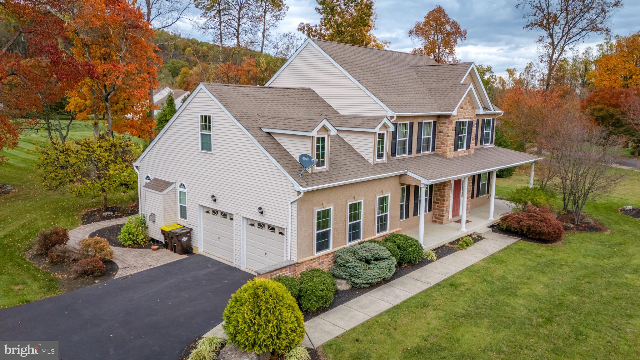 3505 Woodbyne Road Hellertown, PA 18055 - Photo 50 of 78 front view of a house with a yard