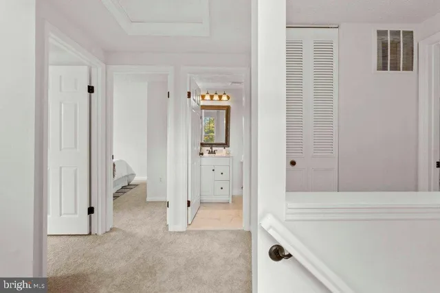 a bathroom with a tub and shower