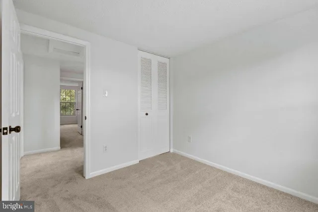 an empty room with closet