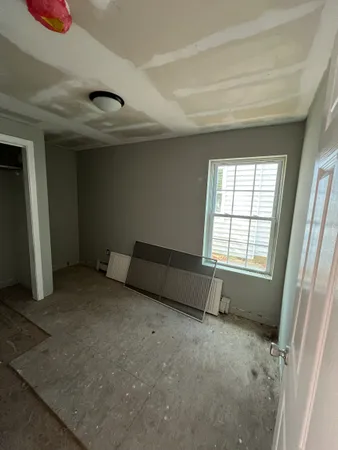 an empty room with windows