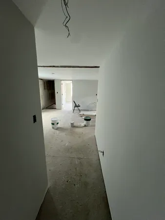 a bathroom with a sink and mirror