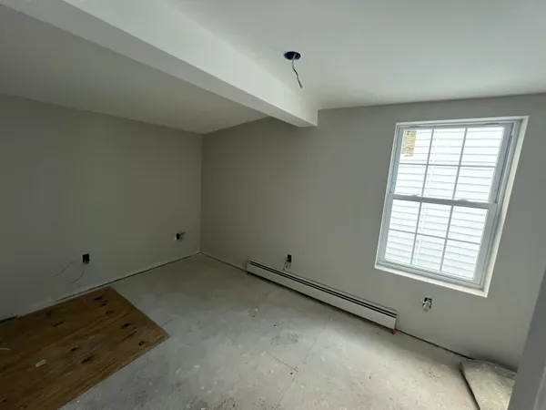 an empty room with windows