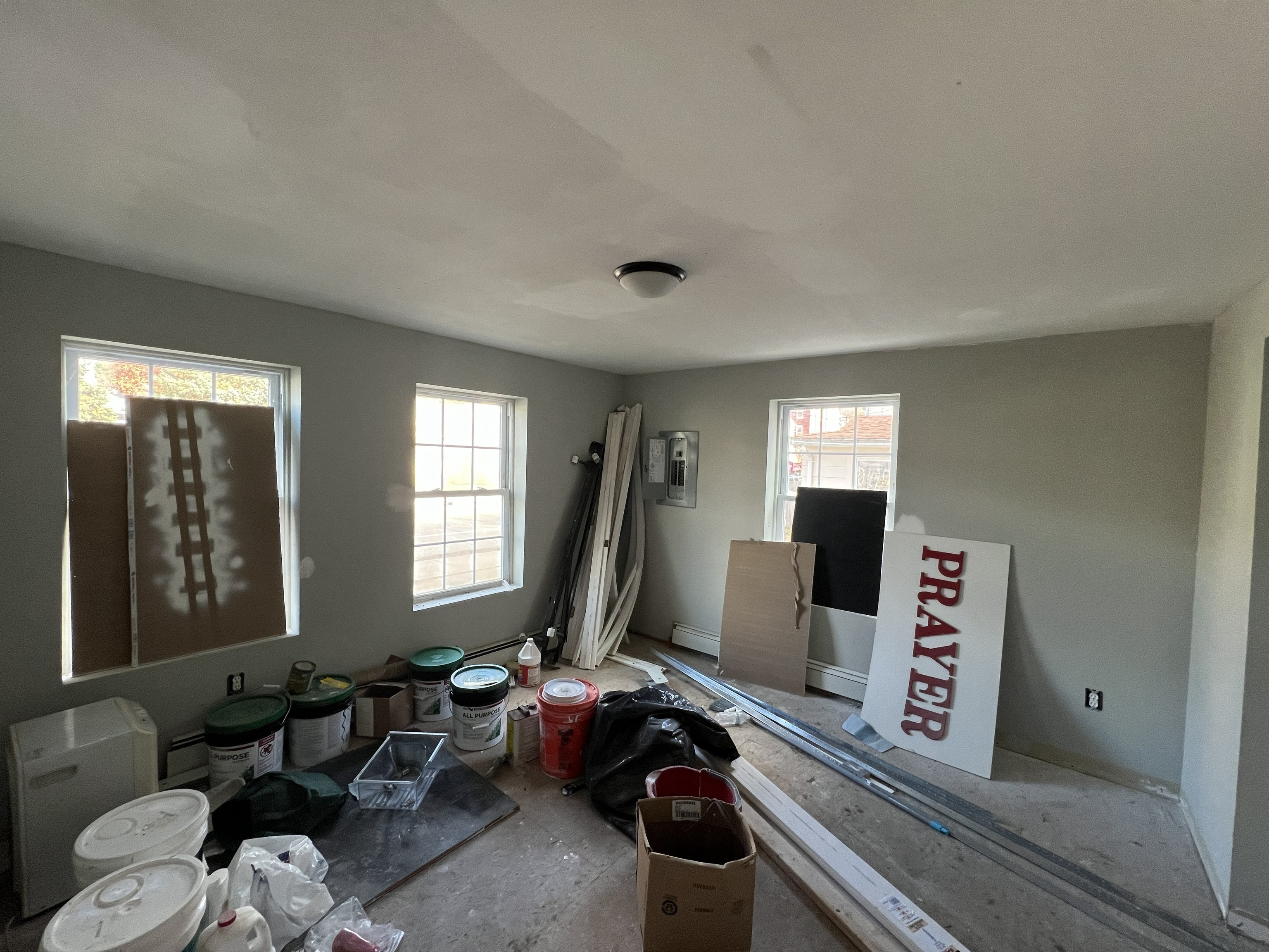 475 East Main Street Norwich, CT 06360 - Photo 6 of 14 a living room with furniture a window and a flat screen tv