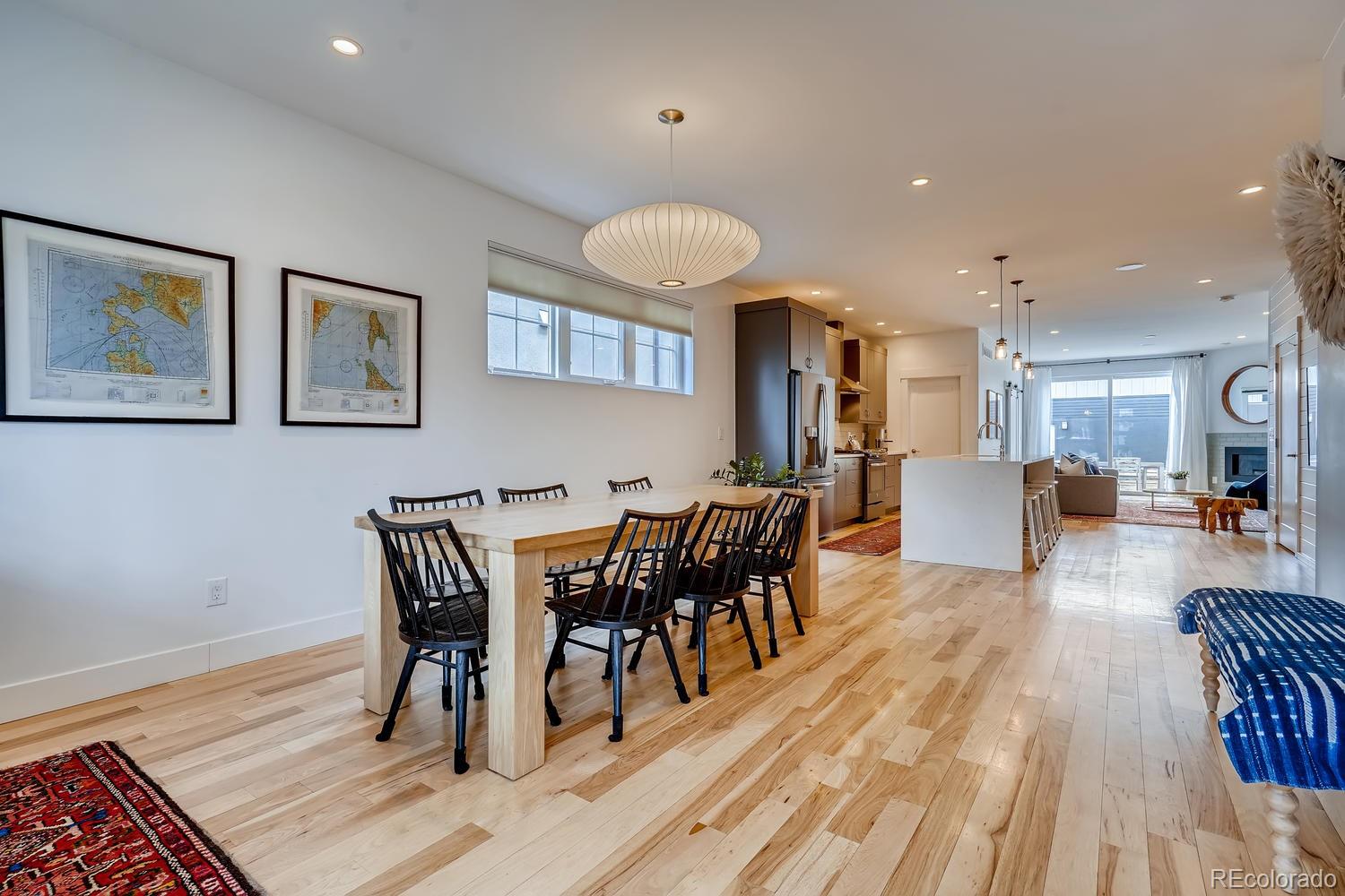 4565 Stuart Street Denver, CO 80212 - Photo 3 of 28 a view of a dining room with furniture