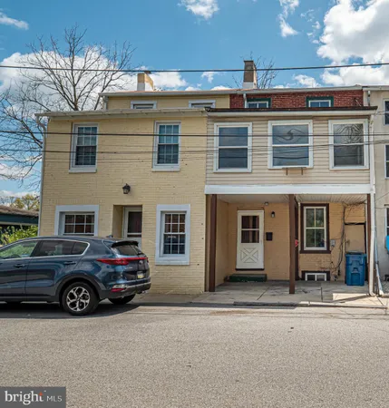 a car parked in front of a building