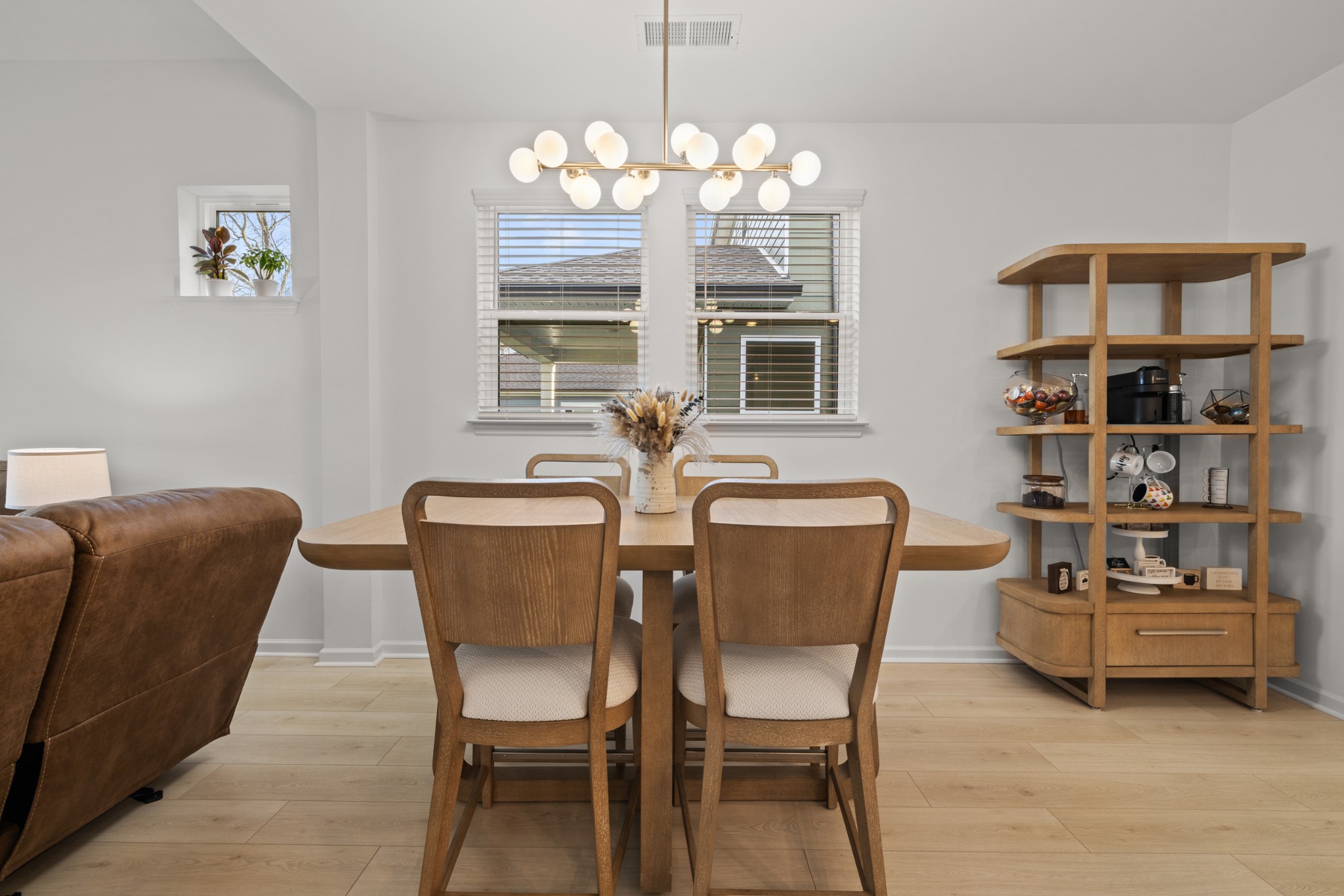 2104 Mackinac Bend Gallatin, TN 37066 - Photo 13 of 23 a view of a dining room with furniture and chandelier