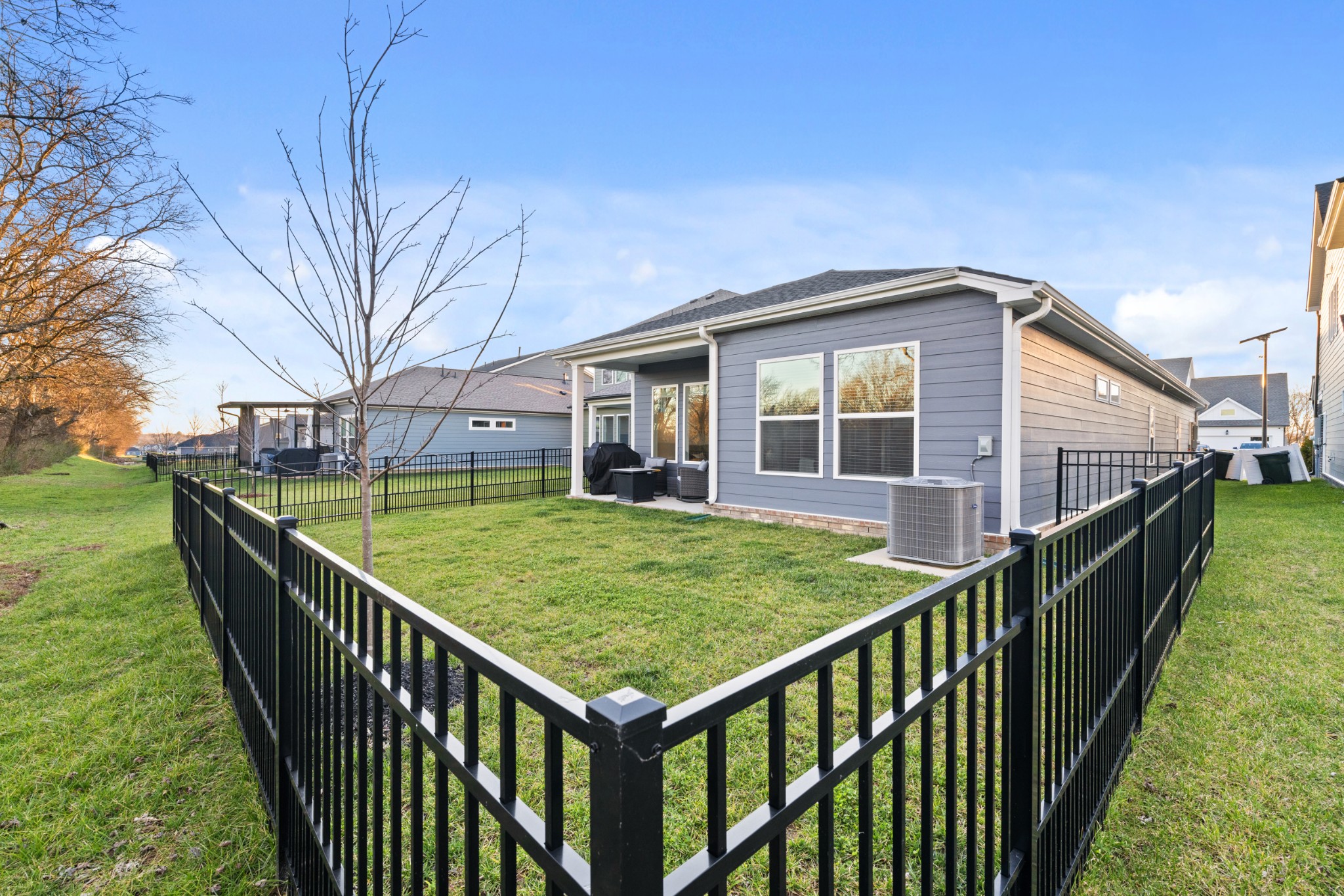 2104 Mackinac Bend Gallatin, TN 37066 - Photo 23 of 23 a view of a house with backyard and deck