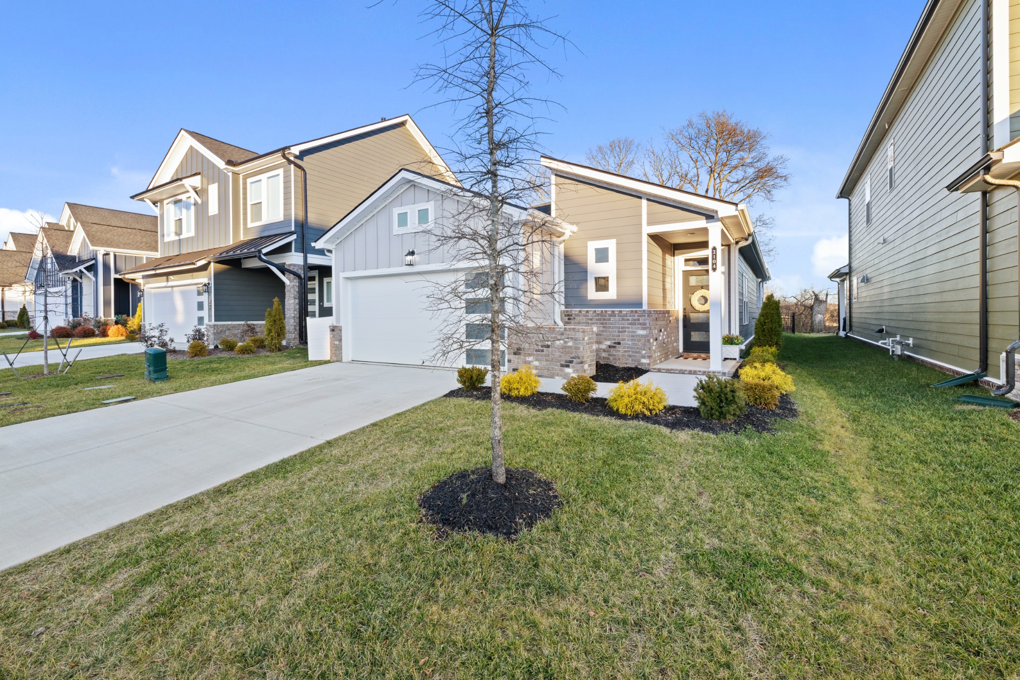 2104 Mackinac Bend Gallatin, TN 37066 - Photo 3 of 23 a front view of house with yard and green space