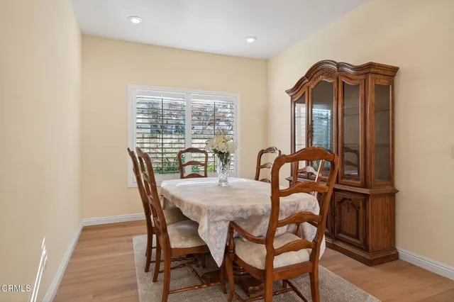 a view of a dining room with furniture window and outside view