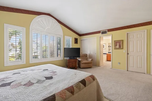 a bathroom with a tub and a shower