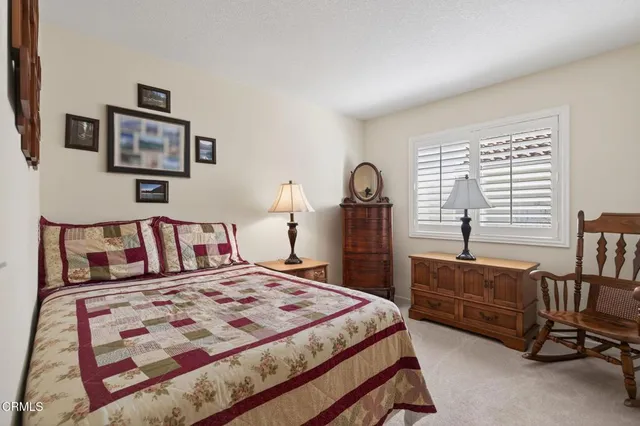 a bathroom with a double vanity sink and mirror