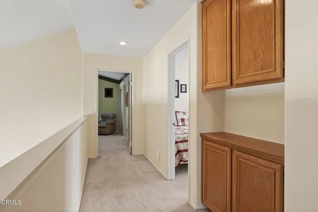 a kitchen with a sink and a refrigerator