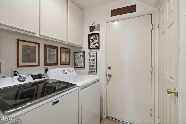 a view of a house with backyard sitting area and garden